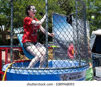 Prattville, Alabama, USA - May 12, 2018: Amanda Curran, A Local WSFA Tv Personality, Gets Dunked At The Autauga County Sheriff's Dunking Booth At The 2018 Prattville Cityfest.