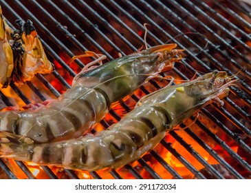 Prawn Grilled Barbecued Mixed Seafood In BBQ Flames.