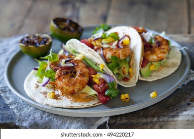 Prawn Tacos With Avocado, Lettuce, Sweet Corn And Tomato Salsa