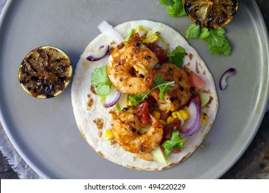 Prawn Tacos With Avocado, Lettuce, Sweet Corn And Tomato Salsa