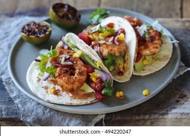 Prawn Tacos With Avocado, Lettuce, Sweet Corn And Tomato Salsa