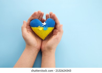 Pray for peace Ukraine. Hands with heart. No war. - Powered by Shutterstock