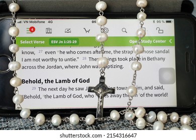 Prayer Beads ( Rosary ) And Digital Bible On A Smartphone.  The New Testament.  12-30-2018