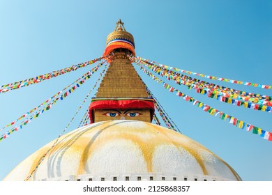 Prayer buddhist flags fluttering in the wind on the Boudhanath stupa in Kathmandu, Nepal.