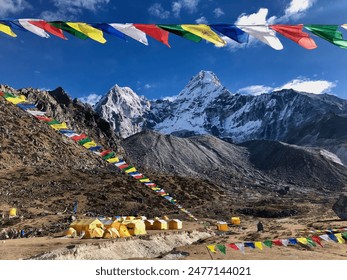 Prayer flags at the Ama Dablam base camp in the Himalayas of Nepal