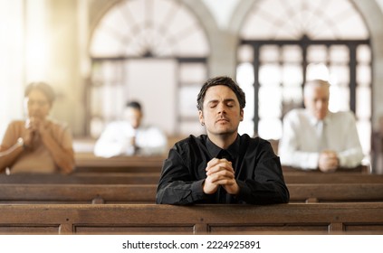 Prayer, religious and young man in church with congregation, faithful and hands together. Religion, male and worship in tabernacle for guidance, spiritual and support with closed eyes and praying