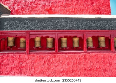 prayer wheel in Shey monastery, Leh Ladakh. Text translation: Om mani padme hum - Powered by Shutterstock