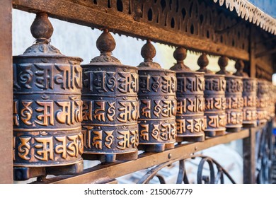 Prayer wheel at the Swayambhunath or Swayambhu ancient religious complex in the Kathmandu city in Nepal
