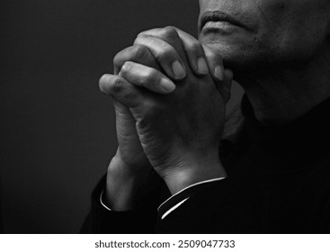 praying to god with hands together Caribbean man praying with white background stock image stock photo - Powered by Shutterstock