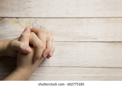 Praying Hands - Shutterstock ID 602775185