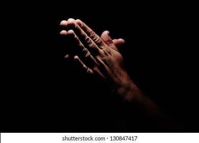 Praying Hands in black background