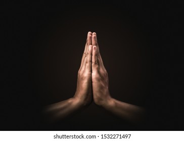 Praying hands with faith in religion and belief in God on dark background. Power of hope or love and devotion. Namaste or Namaskar hands gesture. Prayer position. - Shutterstock ID 1532271497