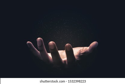 Praying hands with faith in religion and belief in God on blessing background. Power of hope or love and devotion. Magic powder floating on the magician hand. - Shutterstock ID 1532398223