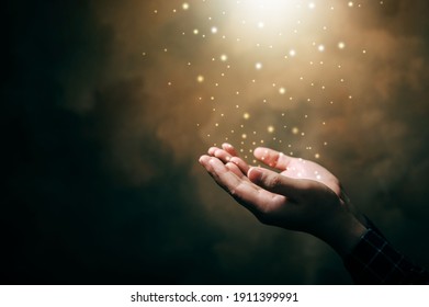 praying hands with faith in religion and belief in God on blessing background. Power of hope or love and devotion. - Shutterstock ID 1911399991