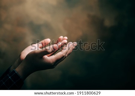 praying hands with faith in religion and belief in God on blessing background. Power of hope or love and devotion.