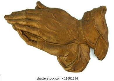 Praying Hands In Gold Isolated On White Background