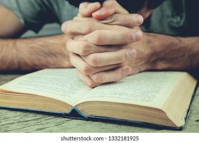 Praying Hands Over Holy Bible Stock Photo (Edit Now) 1332181925