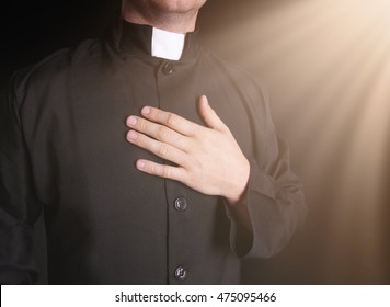 Praying Priest