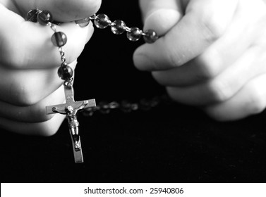 Praying With Rosary Beads