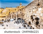 Praying at the Western"Wailing" Wall of Ancient Temple Jerusalem Israel. Western wall of Ancient Jewish Temple built in 100BC on Temple Mount.  Judaisim