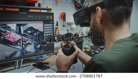 Pre Flight Validation Engineer Testing and Adjusting Drone Performance Parameters. Man Actively Testing Drone Performance Parameters. Concept Critical Pre Flight Validation Process in Specialized Lab.