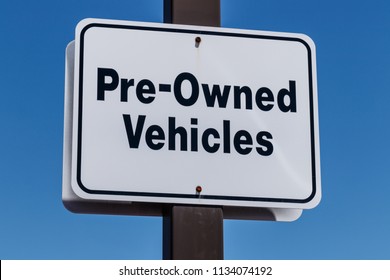 Pre Owned Vehicles Sign At A Used Car Dealership 