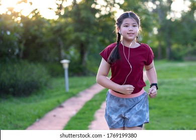 Pre Teen Asian Girl Exercising Outdoors Stock Photo Edit Now