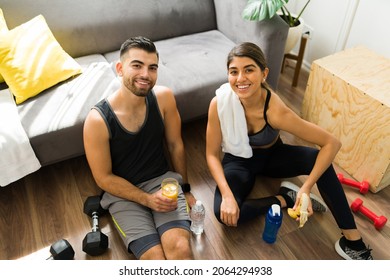 Pre Workout Snack. Portrait Of Fitness Workout Partners Enjoying Some Fruit Before Doing Their Daily Training 