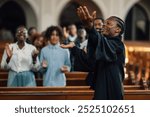 Preacher is delivering a passionate sermon, his hands raised in the air as he speaks to the diverse congregation gathered in the church pews