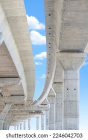 Precast Concrete Columns Structure of Elevated Expressway under Construction against blue sky in vertical frame