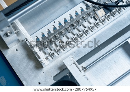 Precision electronic assembly fixture and PCB manufacturing jig for industrial electronics production. Computer and technology parts.