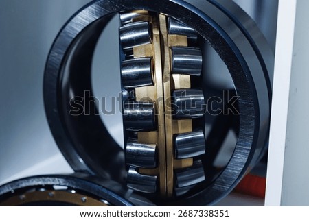 Precision engineering, close-up of cnc machined spherical roller bearings.