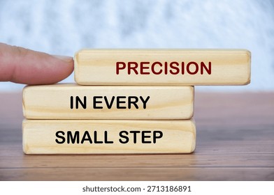 Precision in every small step comes into focus as fingers define each block, echoing accuracy, diligence, and uncompromising attention to detail