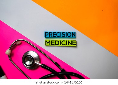 Precision Medicine text on sticky notes with color office desk. Healthcare/Medical concept