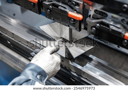 Precision in Motion: A Skilled Operator Shapes Metal with State-of-the-Art Bending Machinery, Transforming Raw Sheets into Custom Creations.