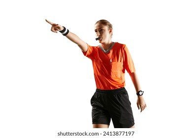 Precision in play. Accuracy of a young female referee on the field, blowing whistle and gesturing against white studio background. Game rules control. Concept of sport, competition, match, profession - Powered by Shutterstock