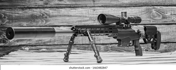 Precision Rifle With Suppressor And Scope