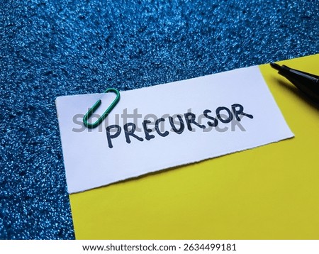 Precursor writting on blue background.