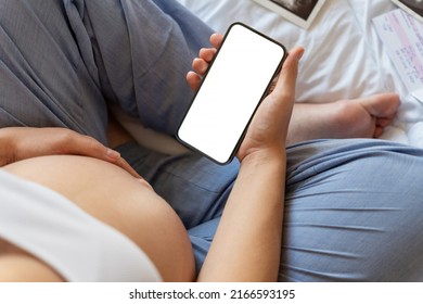 Pregnancy mockup app. Mobile pregnancy online maternity application. Pregnant mother using phone mock up. Pregnancy, medicine, pharmaceutics, health care and people concept - Powered by Shutterstock