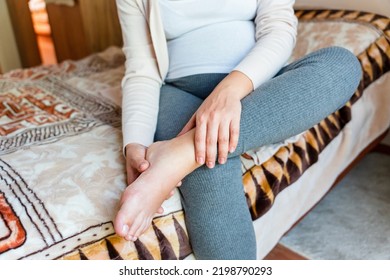 Pregnancy Pain Leg Woman. Pregnant Girl Have Leg Disease, Ankle Pain Doing Health Massage Exercise. Foot Swelling During Pregnancy