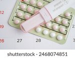 Pregnancy test with birth control pills for female of ovulation day, fetus, maternity, childbirth.