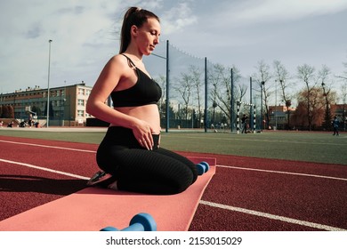 Pregnancy training. Pregnant woman training yoga sport exercise. Prenatal healthy fitness active fit gym outside. Prenatal exercises