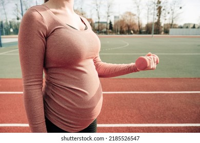 Pregnancy Training. Pregnant Woman Training Yoga Sport Exercise. Prenatal Healthy Fitness Active Fit Gym Outside. Prenatal Exercises