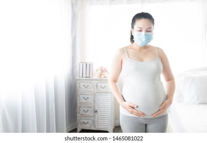 Download Pregnant Asian Female Use Surgical Mask Stock Photo Edit Now 1465081022 PSD Mockup Templates