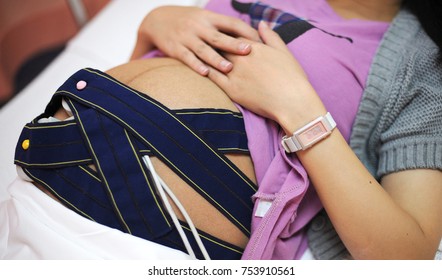 Pregnant Asian Mother Cardio Monitoring Before Giving Birth