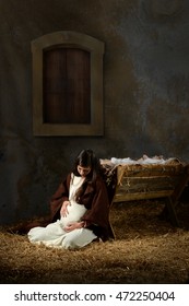 Pregnant Mary And The Manger On Christmas Eve