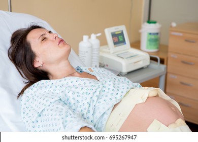 Pregnant Woman In Delivery Room, Having Contractions