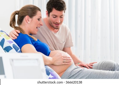 Pregnant Woman In Delivery Room With Her Man