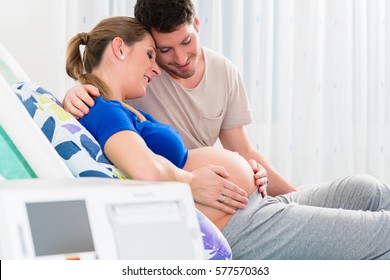 Pregnant Woman In Delivery Room With Her Man