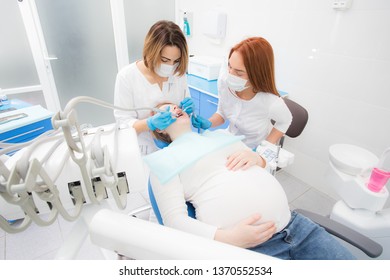 pregnant woman in dentist office, dental treatment for pregnant women